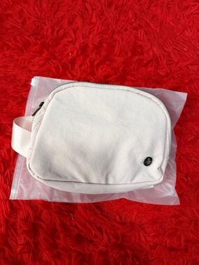 HALARA Pale Pink Compact Crossbody Cosmetic Pouch